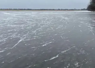 На Миколаївщині поля перетворилися на крижані озера