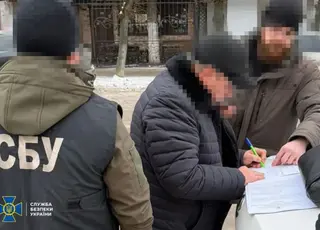 СБУ та НАБУ викрили депутата на оборудках із землею НААН